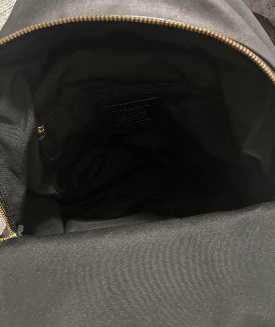 Original Coach (Category: Luxury Bags & Wallets) located in Bulacan. Submitted by vintage_purge (Listing ID 1351365028, Image 3). Description: c o a c h 4700php Width 26cm Height 32cm Depth 10cm Pocket depth 3cm The shape is slightly out of shape, and there are some scratches and stains on the back and metal parts. lets make reading a habit please ask us before proceeding into transactions we cater to those who understands preloved items first to