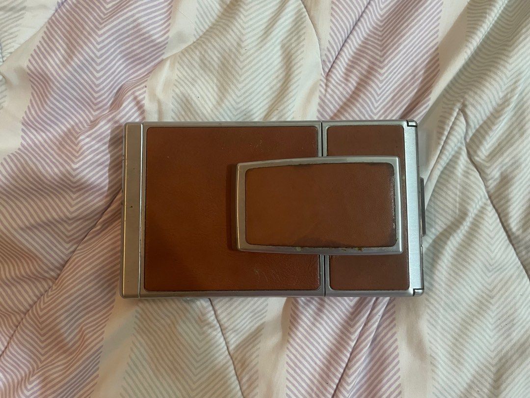 Original Polaroid SX-70 Land Camera (Category: Cameras) located in Quezon City. Submitted by bellalena (Listing ID 1351319280, Image 1). Description: My dad bought this in Japan. Still has the original leather case and prospectus. .