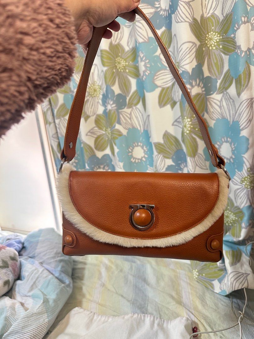 Preloved Salvatore Ferragamo Shoulder Bag (Category: Luxury Bags & Wallets) located in Makati City. Submitted by ainatan30 (Listing ID 1351382723, Image 2). Description: Salvatore Ferragamo Shoulder Bag Gancini Leather Brown with original Dust Bag and Care Card. .