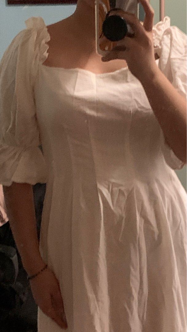 Ruffle Puff Sleeve White Dress (Category: Dresses) located in Magalang. Submitted by bakedpotatoes_ (Listing ID 1342203658, Image 2). Description: ✨ Medium ✨ Shipping fee would be shouldered by the buyer ✨ Payment through GCash/Maya 📍Pampanga.