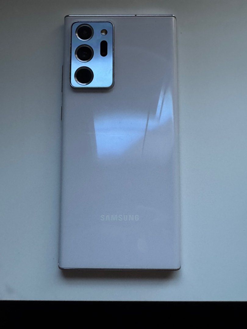 SAMSUNG NOTE 20 ULTRA 5G (KOREAN VARIANT) (Category: Samsung) located in Paranaque City. Submitted by matt91827 (Listing ID 1351341993, Image 2). Description: SAMSUNG NOTE 20 ULTRA 5G 12GB 256GB KT Variant — Openline Qualcomm Snapdragon 865+ 120Hz Refresh Rate All Original parts Working Fingerprint Makinis ang Frame Intact parin ang buttons Perfect condition S-Pen Hindi basag ang audio ISSUE: 2 Lines sa LCD, Seamless na slightest Screen Burn, one