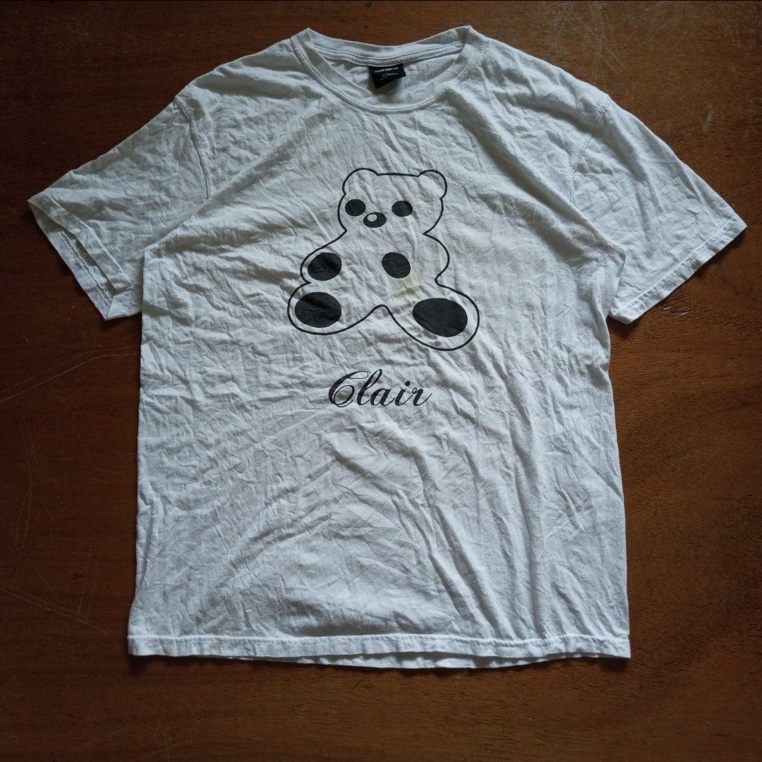 Sinclair Global Anniversary Bear T-shirt (Category: Luxury Apparel) located in Tayabas. Submitted by cat.b0i (Listing ID 1351279131, Image 1). Description: Sinclair Global Anniversary Bear T-shirt Fitting: M- (Semi XL-XL) F - (XL-semi 2XL) length: 29 width: Body: 22 Shoulder: 19.5 arm space: 9.5 sleeve length: 8.5 color: white with black graphic material: 100% cotton issue: washable stains condition: excellent.