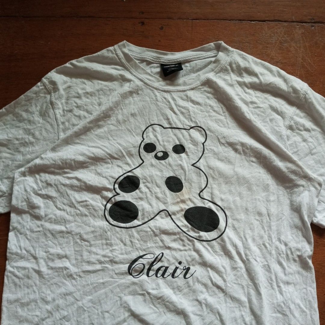 Sinclair Global Anniversary Bear T-shirt (Category: Luxury Apparel) located in Tayabas. Submitted by cat.b0i (Listing ID 1351279131, Image 3). Description: Sinclair Global Anniversary Bear T-shirt Fitting: M- (Semi XL-XL) F - (XL-semi 2XL) length: 29 width: Body: 22 Shoulder: 19.5 arm space: 9.5 sleeve length: 8.5 color: white with black graphic material: 100% cotton issue: washable stains condition: excellent.