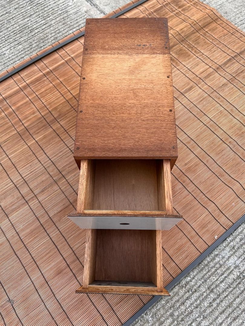 Vintage Wooden Two-Drawer Storage Box (Category: Shelves, Cabinets & Racks) located in General Trias. Submitted by tenshijapan (Listing ID 1351254080, Image 2). Description: This charming vintage wooden two-drawer storage box is a perfect addition to any home or workspace. Crafted with a combination of wood and a light-colored front panel, this piece offers both functionality and rustic appeal. Ideal for organizing small items such as jewelry, of