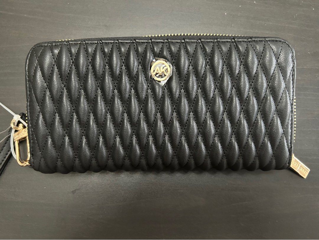 Anne Klein Black Ruched Long Wallet (Category: Wallets & Card holders) located in Makati City. Submitted by laract (Listing ID 1351603912, Image 1). Description: Brand new with tag 12 card slots.