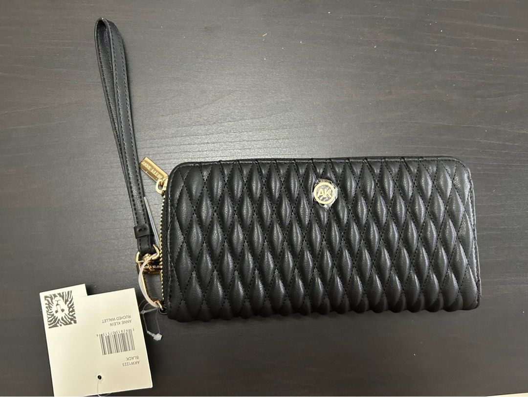 Anne Klein Black Ruched Long Wallet (Category: Wallets & Card holders) located in Makati City. Submitted by laract (Listing ID 1351603912, Image 3). Description: Brand new with tag 12 card slots.