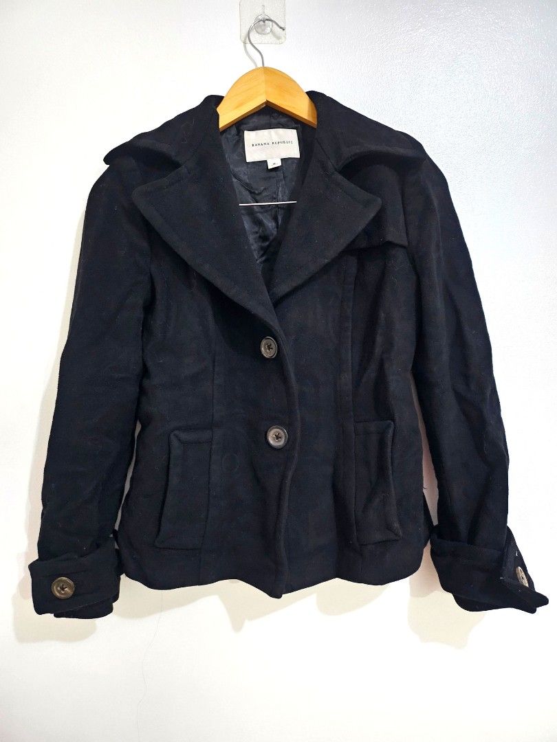 BANANA REPUBLIC BLACK WOOL COAT (SIZE M) (Category: Coats, Jackets and Outerwear) located in Paranaque City. Submitted by seriousshopper678 (Listing ID 1351554572, Image 2). Description: BANANA REPUBLIC BLACK WOOL COAT (SIZE M) fits small to semi-med frames. Black wool material. fully lined. with side pockets. two button jacket. wide collar. crumpled but just needs to be steamed. Shipping c/o buyer through Lalmove or Grab. Payment via Gcash/BDO/B