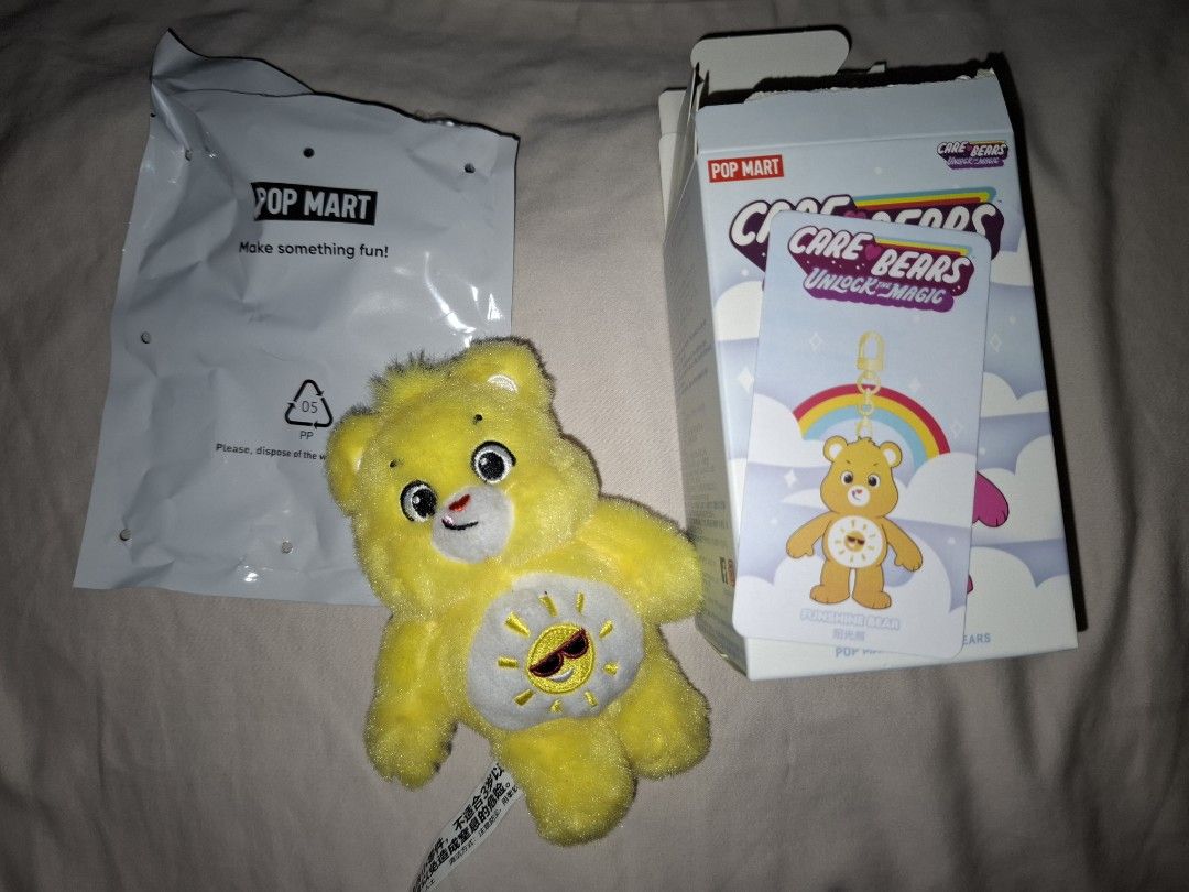 Care Bears Unlock the magic (Funshine Bear) (Category: Designer & Blind Box Toys) located in Manila. Submitted by msmacaroon (Listing ID 1351437373, Image 2). Description: Didnt use, i only hang it w/ my other keychains W/ box & foil Bought at Popmart hongkong selling it for low price MOP: Gcash, BDO MOD: lalamove (payment must be shouldered by the buyer) Loc: Vito cruz taft manila.