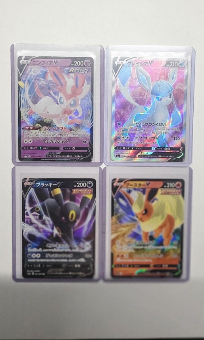 Eve Evolution set (Category: Raw Cards) located in Singapore. Submitted by hendricyew (Listing ID 1351582017, Image 1). Description: 2021 Eve evolution set, selling as a set All cards have no visible damage, centering good. But flameron seems to have a very tiny white at the bottom (picture 3) Meet up Jurong point(Boon lay)/ Gek Poh Shopping centre.