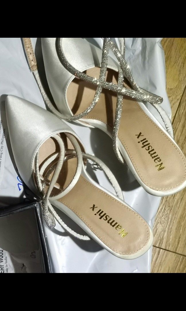 For sale shoes w/ heels (Category: Heels) located in Pasig City. Submitted by aillegra (Listing ID 1351482913, Image 2). Description: For sale sandals W/ heels 1 3/4 Off white Size 7.5 women 10/10 condition.