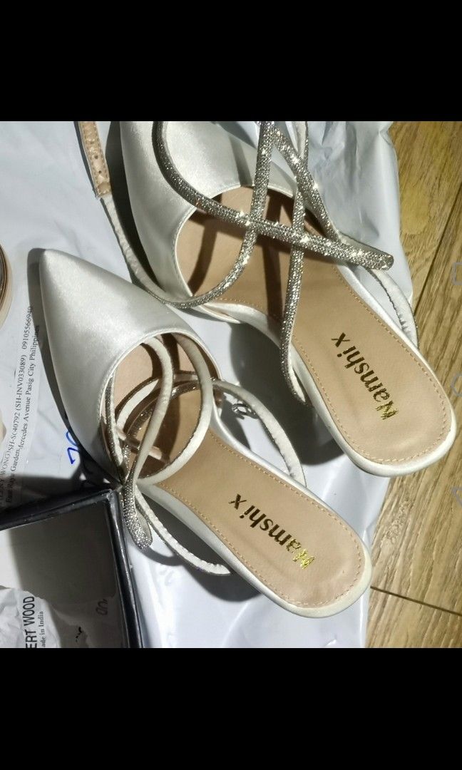For sale shoes w/ heels (Category: Heels) located in Pasig City. Submitted by aillegra (Listing ID 1351482913, Image 3). Description: For sale sandals W/ heels 1 3/4 Off white Size 7.5 women 10/10 condition.