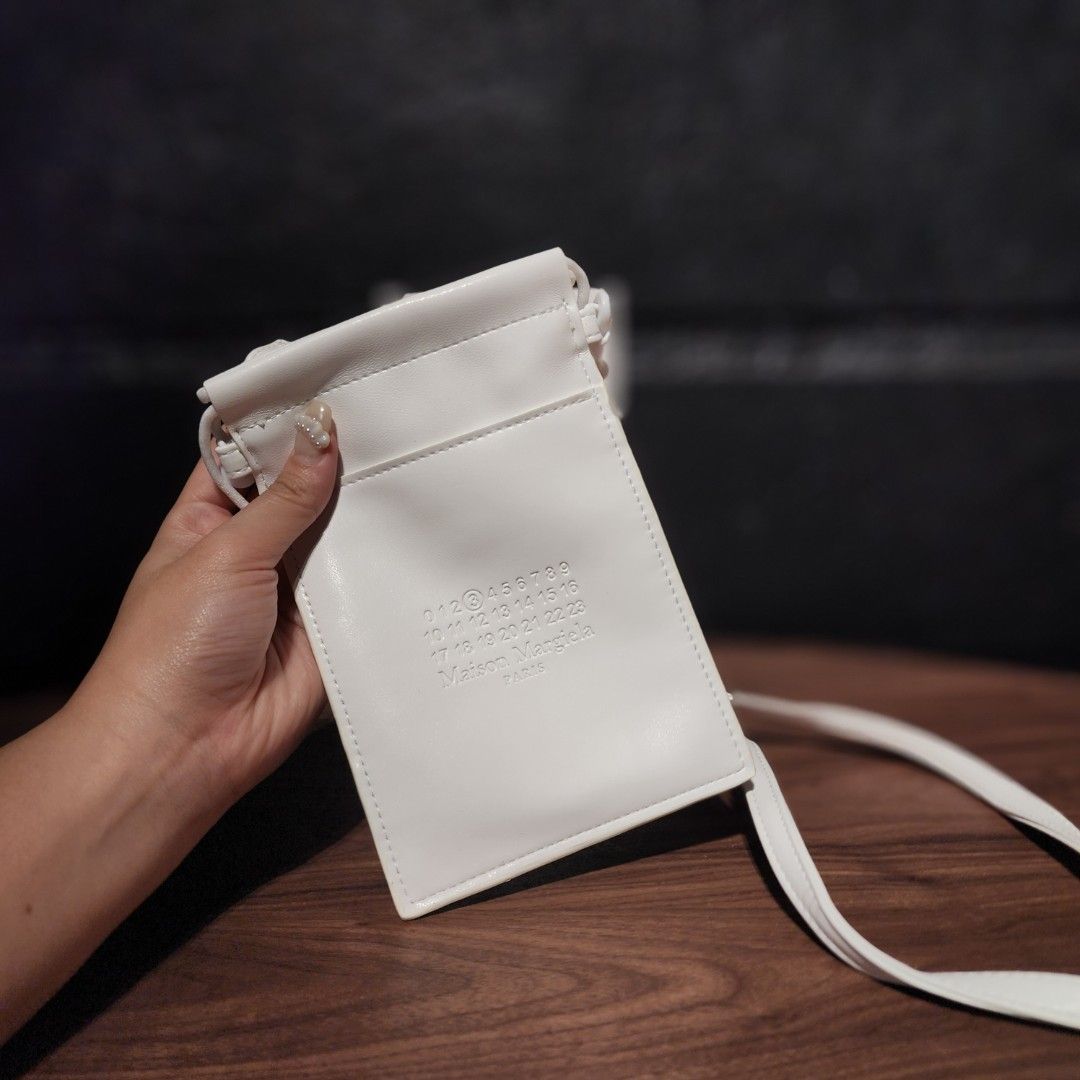 Maison Margiela White Leather Sling Bag (Category: Luxury Bags & Wallets) located in Manila. Submitted by lachinitasph_ (Listing ID 1351584596, Image 2). Description: .