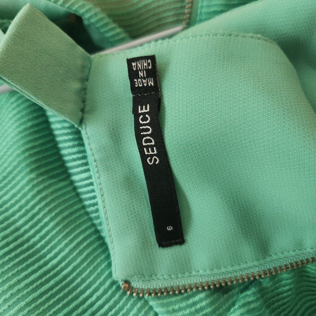Mint Green Formal Dress (Category: Dresses) located in Manila. Submitted by hungryforclothes (Listing ID 1351508004, Image 2). Description: Used once With small hole on the back (check photo #3) Sleeves are sewn to shorten it (can be removed) Bought from Australia Size AU 6 on tag (fits XS).