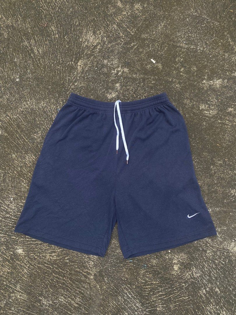 Nike cotton shorts (Category: Shorts) located in Digos. Submitted by oldtuff_ (Listing ID 1351472924, Image 1). Description: Waist: 32-38 stretchable length: 20 leg opening: 13 color rate: 9.5/10 no issue good as new condition .