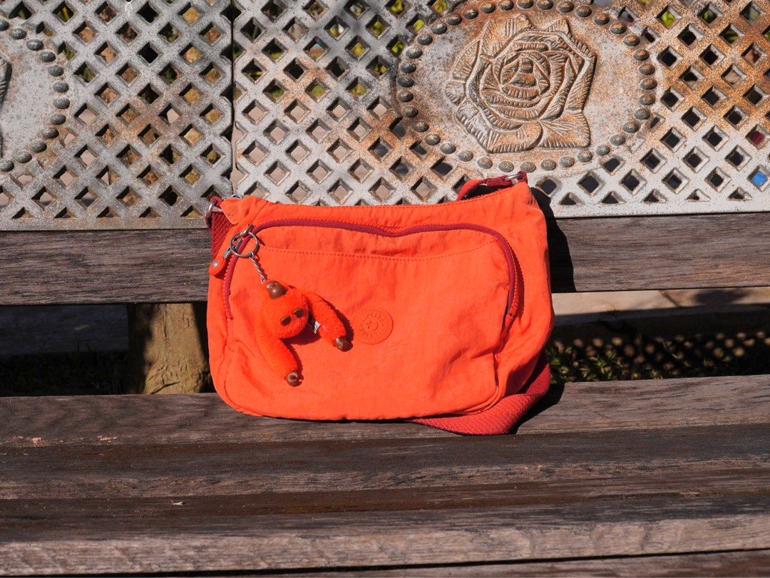 Original Orange Kipling Shoulder Bag (Category: Shoulder Bags) located in Cavite. Submitted by joolei.declutter (Listing ID 1351433182, Image 1). Description: ‼️ PLS READ FIRST, NO READ NO REPLY 🚫 no haggling please, last price posted! ‼️ PAYMENT FIRST BEFORE RESERVING 💵 selling for PHP 1,500 ✦ RFS: not using anymore 🛍️ original price is ~PHP 4,000 👉 bought at Kipling SM Dasmarñas 💸 MOP GCash, Maya, Bank Transfer 💖 first to pay reserves & g