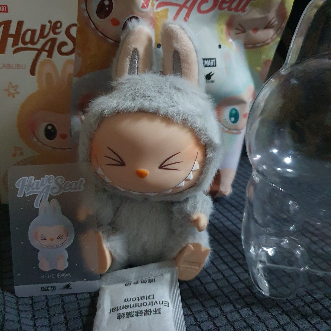 Popmart Labubu Have a Seat v2 Hehe (Category: Designer & Blind Box Toys) located in Caloocan City. Submitted by the_boxph (Listing ID 1351441796, Image 2). Description: For sale labubu Hehe 800 pesos with Acrylic Case last price posted Still comes with Box, Card and etc. Used only for display location: North Caloocan.