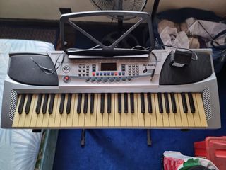 rj piano keyboard and stand