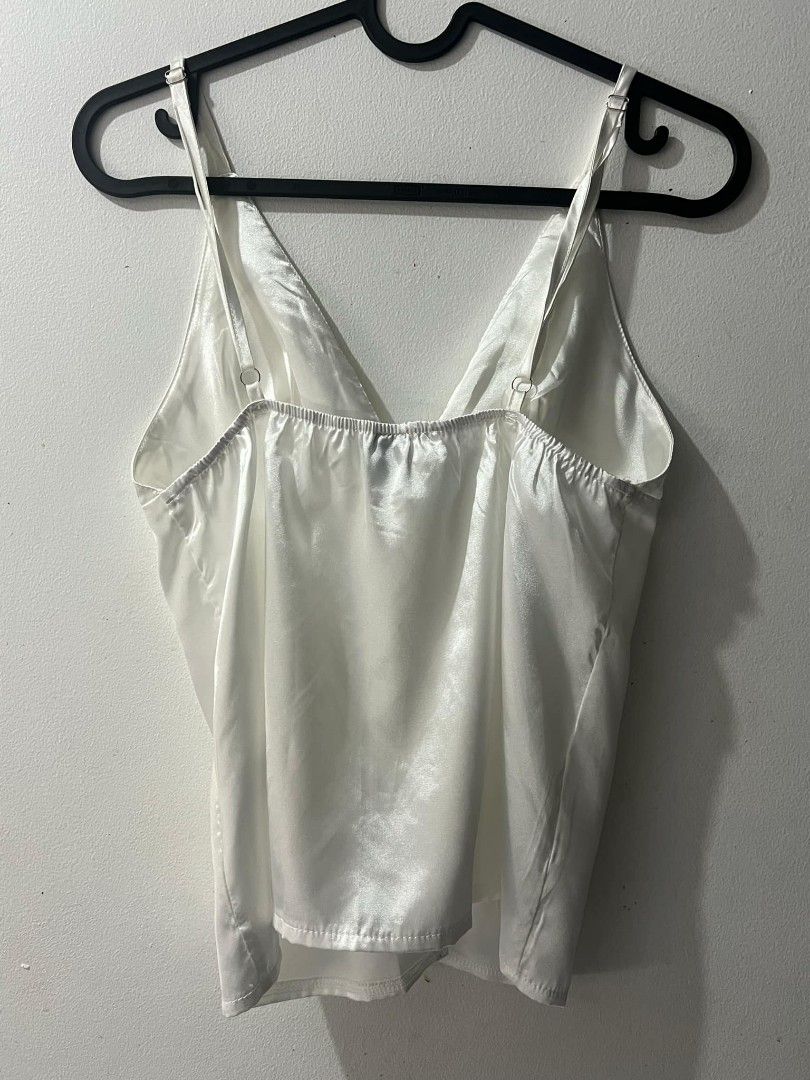 Sexy satin camisole top (Category: Others Tops) located in Manila. Submitted by nik.declutters (Listing ID 1351563241, Image 2). Description: XS Brand new never been used last pic is ww with different color.