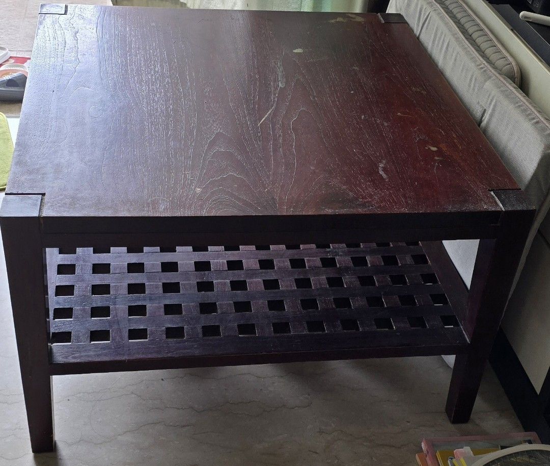 Super Solid Wood Coffee Table (Category: Tables & Sets) located in Singapore. Submitted by casein (Listing ID 1351441913, Image 2). Description: Square 78 cm. Tall 48 cm. Should fit most MPV. Super solid heavy Oak wood. No nails, carefully engineered wood joint. Can sit on it. Revarnish or use as is. It is so solid that we do not think it can be broken! 😂 Flat too small😢.