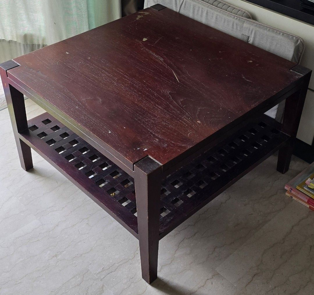 Super Solid Wood Coffee Table (Category: Tables & Sets) located in Singapore. Submitted by casein (Listing ID 1351441913, Image 3). Description: Square 78 cm. Tall 48 cm. Should fit most MPV. Super solid heavy Oak wood. No nails, carefully engineered wood joint. Can sit on it. Revarnish or use as is. It is so solid that we do not think it can be broken! 😂 Flat too small😢.