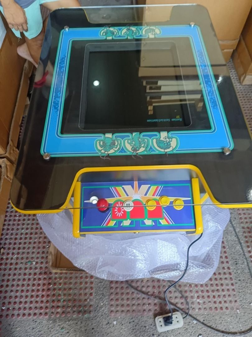 Table Top Arcade Machine (Category: Nintendo) located in San Pablo. Submitted by ablpsports (Listing ID 1351488387, Image 3). Description: Table Top Arcade 📍For Sale:₱54,879.00 📍For Rent: ₱5,700 daily + refundable security deposit+ delivery fee Specification: 🕹Size: W64.5*L93*H73.5cm 🕹LCD: 19 inch 🕹Weight: 60KG 🕹Material : MDF wood 🕹Game: 60 in 1 🕹player: 2 player 🕹Voltage: 110/220V available design: NBA-JAM SUPER MARIO STREET FIGHTER TH