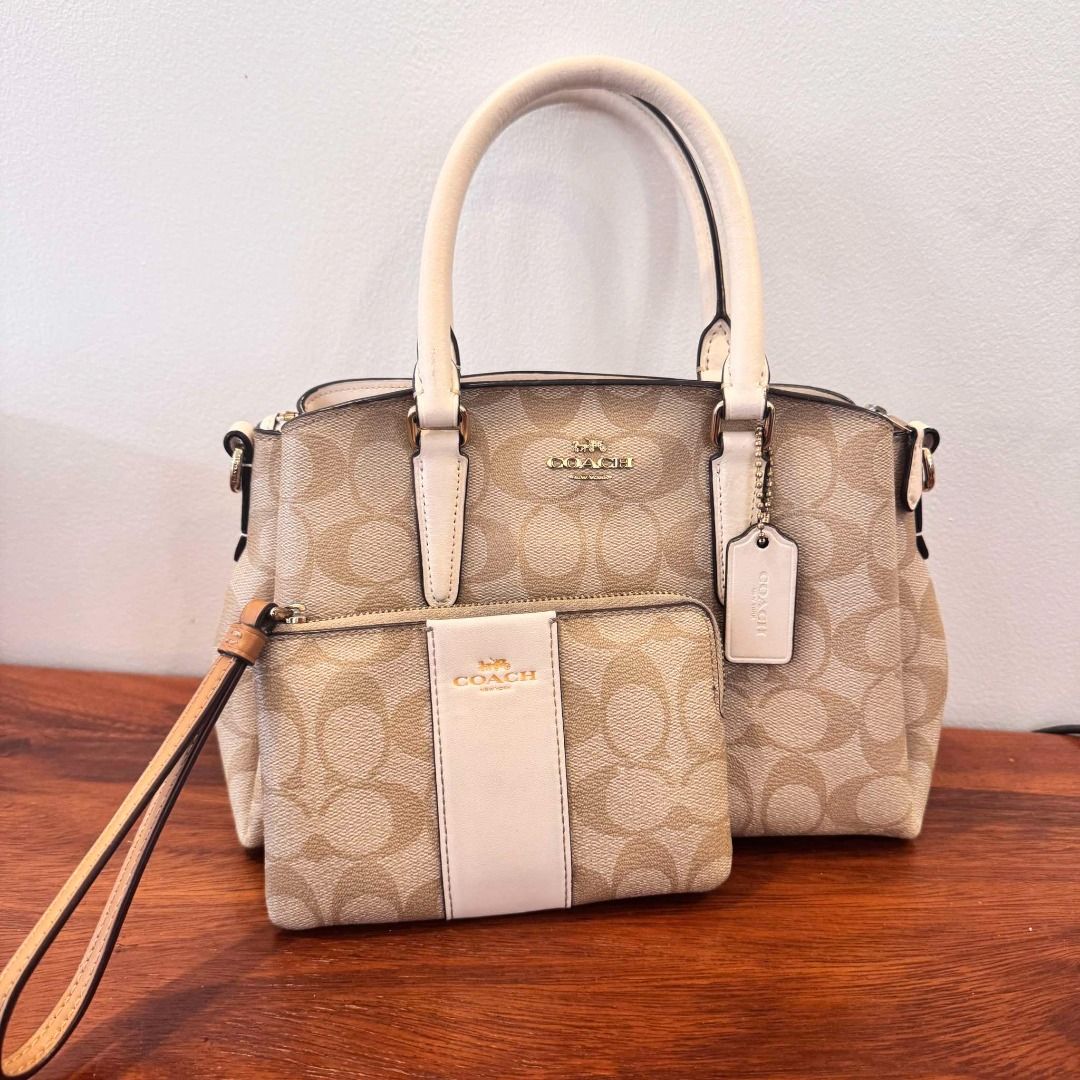 Authentic Coach Bag & Wristlet (Category: Luxury Bags & Wallets) located in Manila. Submitted by nikkabeybeh (Listing ID 1351734213, Image 1). Description: Slightly used Coach bag & wristlet for sale. Shipping from La Union, fee should be handled by buyer..