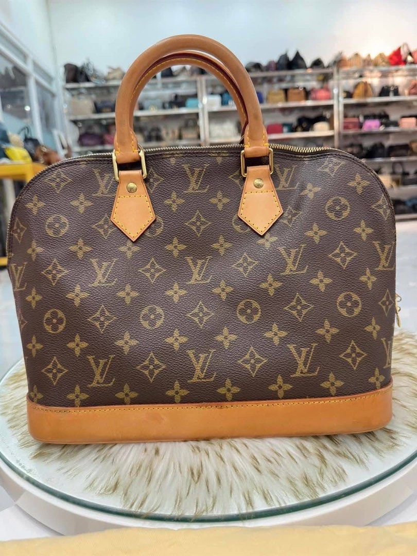 Authentic Lv Alma Mm Bag 2 way (Category: Luxury Bags & Wallets) located in Quezon City. Submitted by jhaediah (Listing ID 1351694440, Image 2). Description: - Authentic 💯 - L V Alma Mm Bag 2 way - With replacement strap not sure if original - Medium size - Inclusion: with original dustbag .