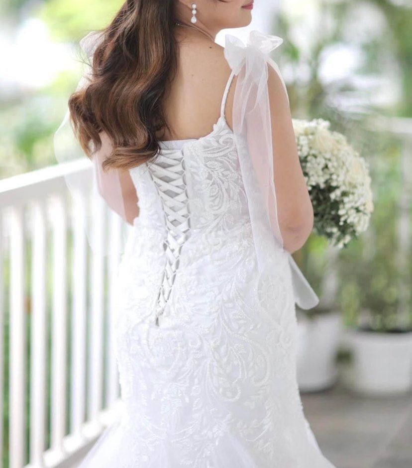 Mermaid cut Wedding gown (Category: Evening dresses & gowns) located in Marikina City. Submitted by aykhia (Listing ID 1351665209, Image 3). Description: NEGOTIABLE Wedding gown (mermaid cut) Can fit up to medium frame (adjustable strap) Dry cleaned already Freebies: ✔️ detachable ribbon ✔️ veil ✔️ cord ✔️ 2pcs heart pillows ✔️ arras ✔️ serpentina ✔️ hair accessories My size: bust 34", waistline 27" & height 4'11 Pick-up: Nangka,Marikina Book you