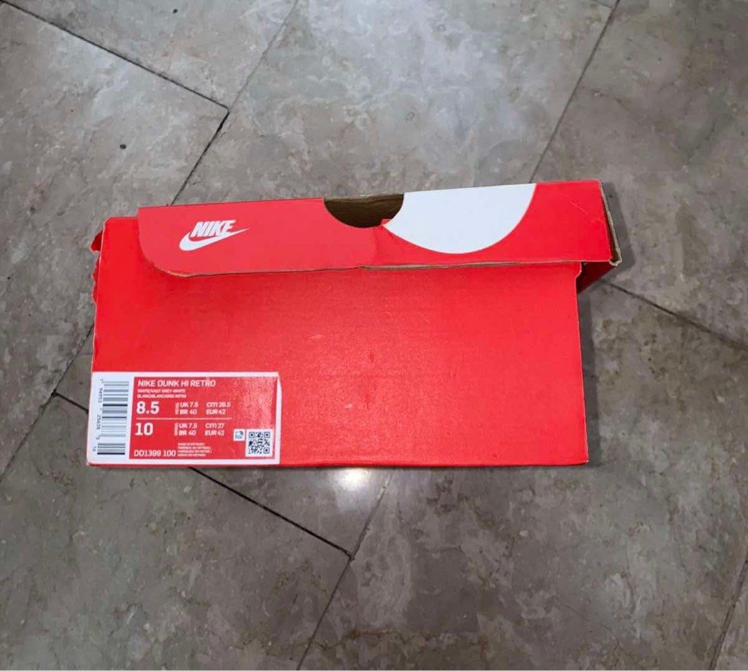 Nike Dunk High Retro (Category: Sneakers) located in Pasig City. Submitted by bdeclutter (Listing ID 1351607995, Image 3). Description: Nike Dunk High Retro Size 8.5 Mens/Size 10 Wmns White/Vast Grey White Colorway Used twice only. Good as new..