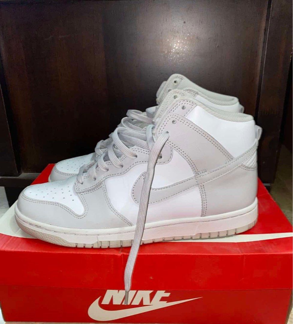 Nike Dunk High Retro (Category: Sneakers) located in Pasig City. Submitted by bdeclutter (Listing ID 1351607995, Image 2). Description: Nike Dunk High Retro Size 8.5 Mens/Size 10 Wmns White/Vast Grey White Colorway Used twice only. Good as new..