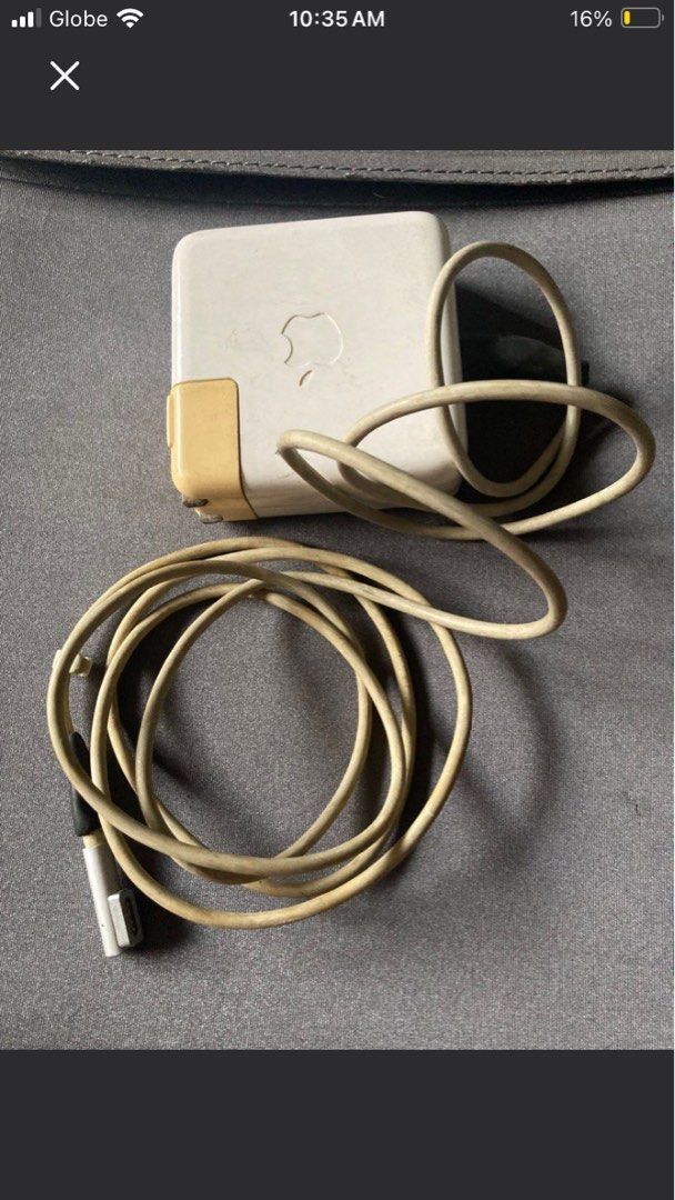 Old macbook power adaptor (Category: Cables & Adaptors) located in Mandaluyong City. Submitted by rominagrace (Listing ID 1351622159, Image 1). Description: Old macbook adaptor, working, hard to find.