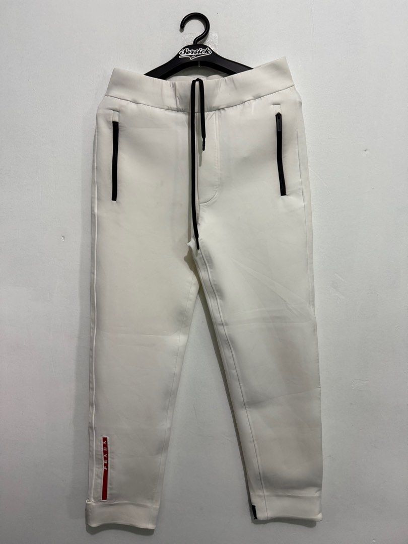Prada white recycled double jersey pants (Category: Joggers) located in Sorsogon. Submitted by jovert_23alviz (Listing ID 1351646133, Image 1). Description: Prada white recycled double jersey pants Tech fabric pants Size S Waistline 28-32 Lenght 38 inch Adjustable hem 13k.