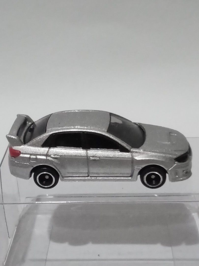 Subaru Impreza WRX STI No.7 (Category: Vehicle & Diecast Models) located in San Pedro. Submitted by 0bennyfitus0 (Listing ID 1351623057, Image 2). Description: Tomica No.7 Subaru Impreza WRX STI 4 door In excellent condition. Displayed only. Never played. What you see is what you get..