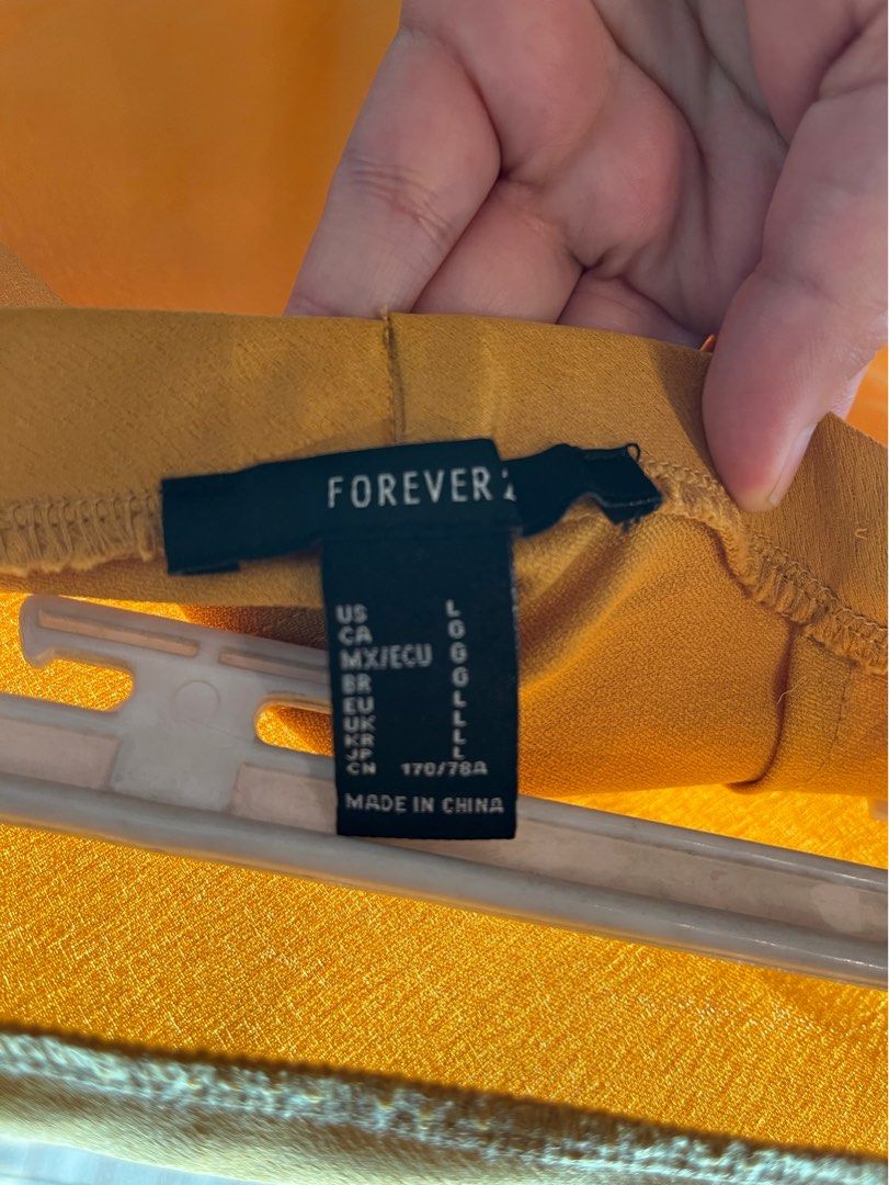 Yellow Silk Like Skirt (Category: Skirts) located in Makati City. Submitted by messbless (Listing ID 1351731143, Image 3). Description: Garter waist.