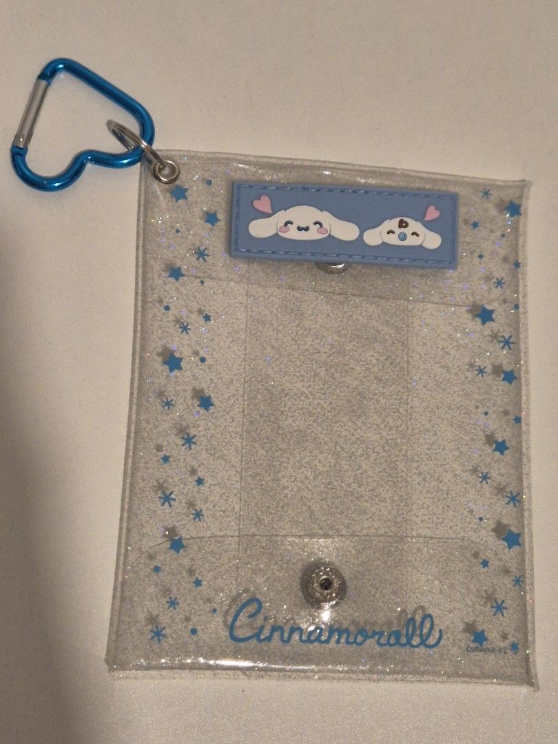 Cinnamoroll pouch keyring (Category: Character Goods) located in Makati City. Submitted by Vnerrie (Listing ID 1351808516, Image 1). Description: Cinnamoroll pouch keyring Glittery design on the PVC pouch - water resistant You can place your toy plush inside and hang on your bags..