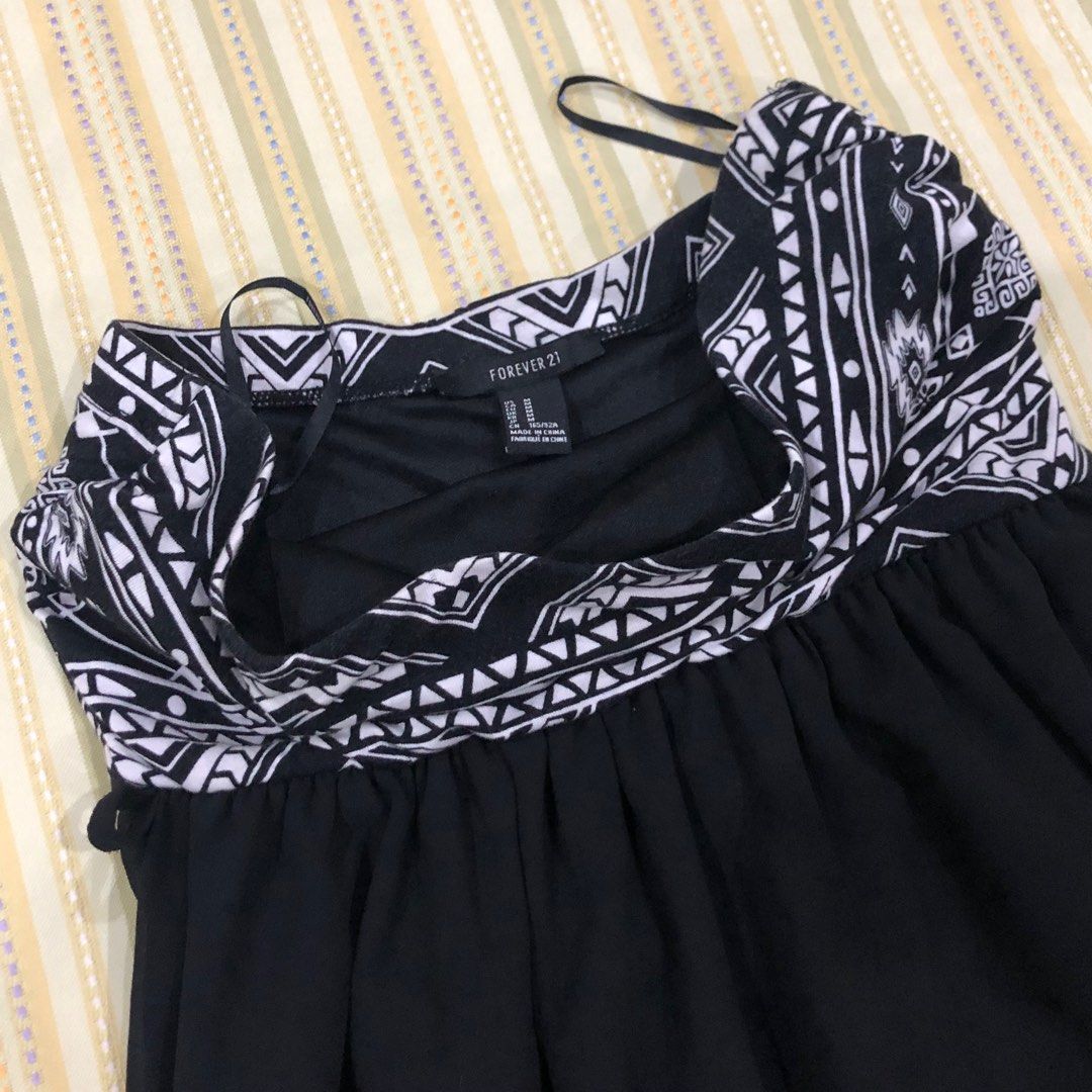 FOREVER 21 (BLACK/WHITE) Dress (Category: Dresses) located in Malabon City. Submitted by ___holly (Listing ID 1351831537, Image 2). Description: FOREVER 21 (BLACK/WHITE) Dress for PHP 400 (negotiable) Available size (on tag & when laid flat): (1) M / 165 / 92A: 35 cm (stretchable) bust / 66 cm (front) length / 100 cm (back) length Payments are accepted via GCash, SeaBank, and BPI only. (NO COD) .
