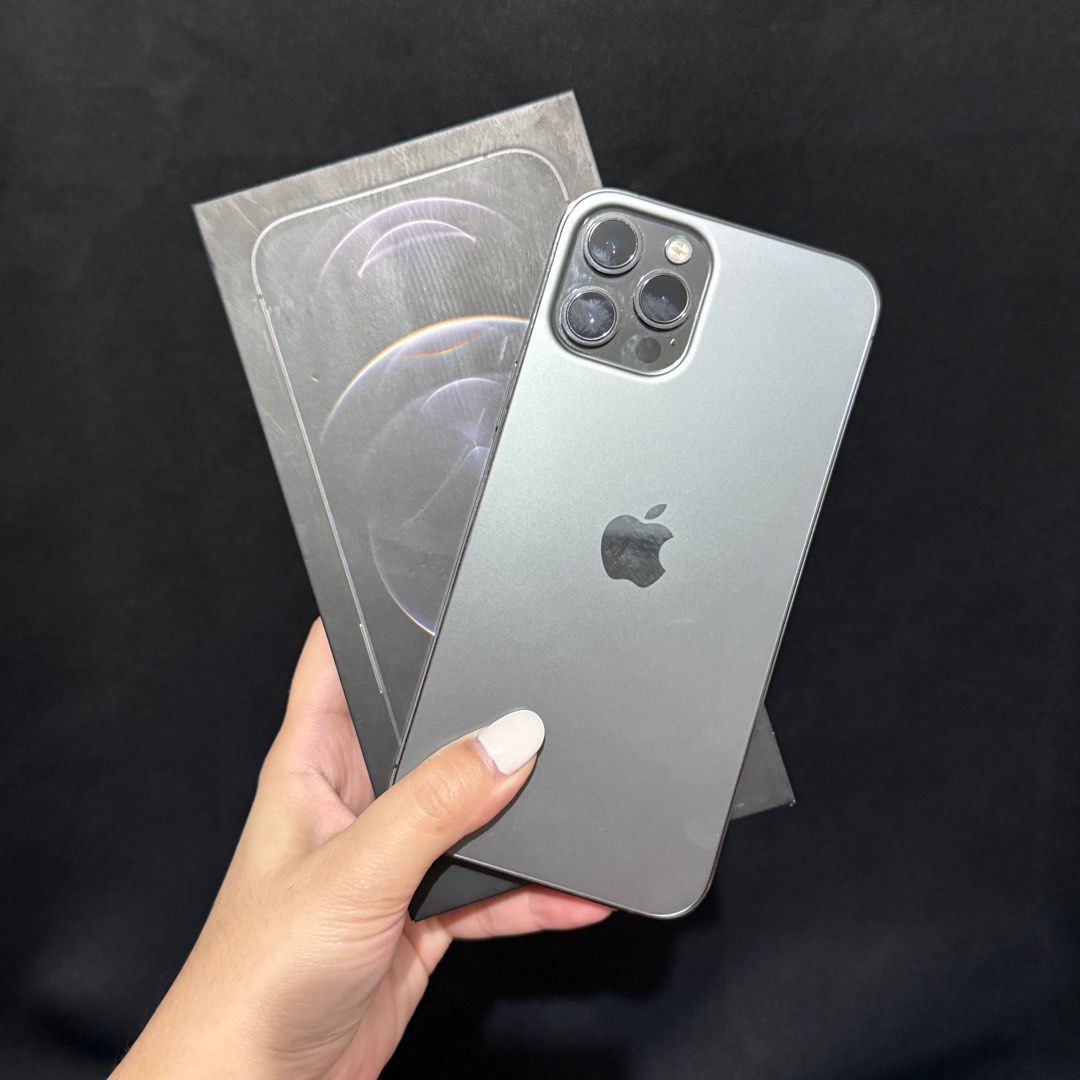 iPhone 12 Pro Max 128GB (Category: iPhone 12 Series) located in Bulacan. Submitted by clnlzr (Listing ID 1351909425, Image 1). Description: Iphone 12 Pro Max 128GB Graphite - factory unlocked - original box - 77% batt health - true tone ✅ - face ID ✅ - phone cases included (2-3) .