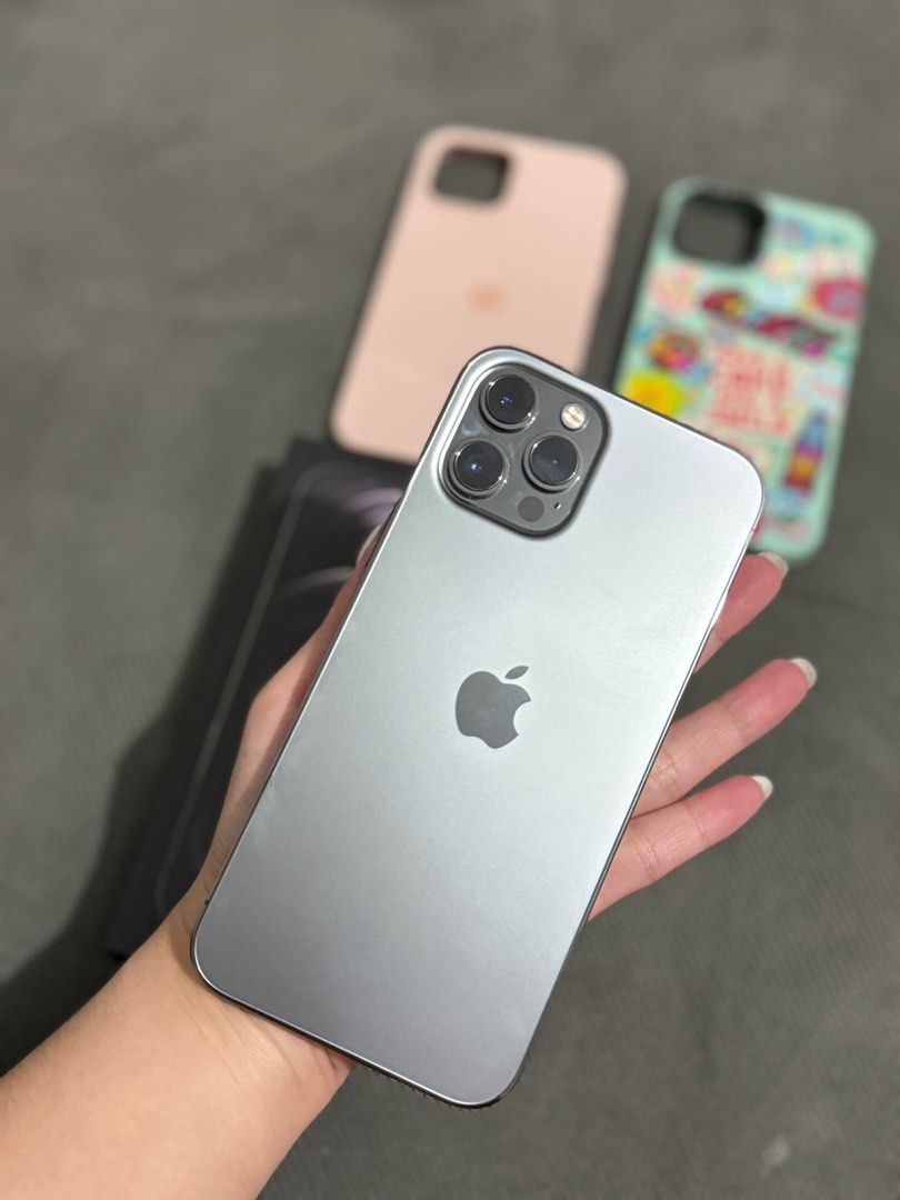 iPhone 12 Pro Max 128GB (Category: iPhone 12 Series) located in Bulacan. Submitted by clnlzr (Listing ID 1351909425, Image 3). Description: Iphone 12 Pro Max 128GB Graphite - factory unlocked - original box - 77% batt health - true tone ✅ - face ID ✅ - phone cases included (2-3) .