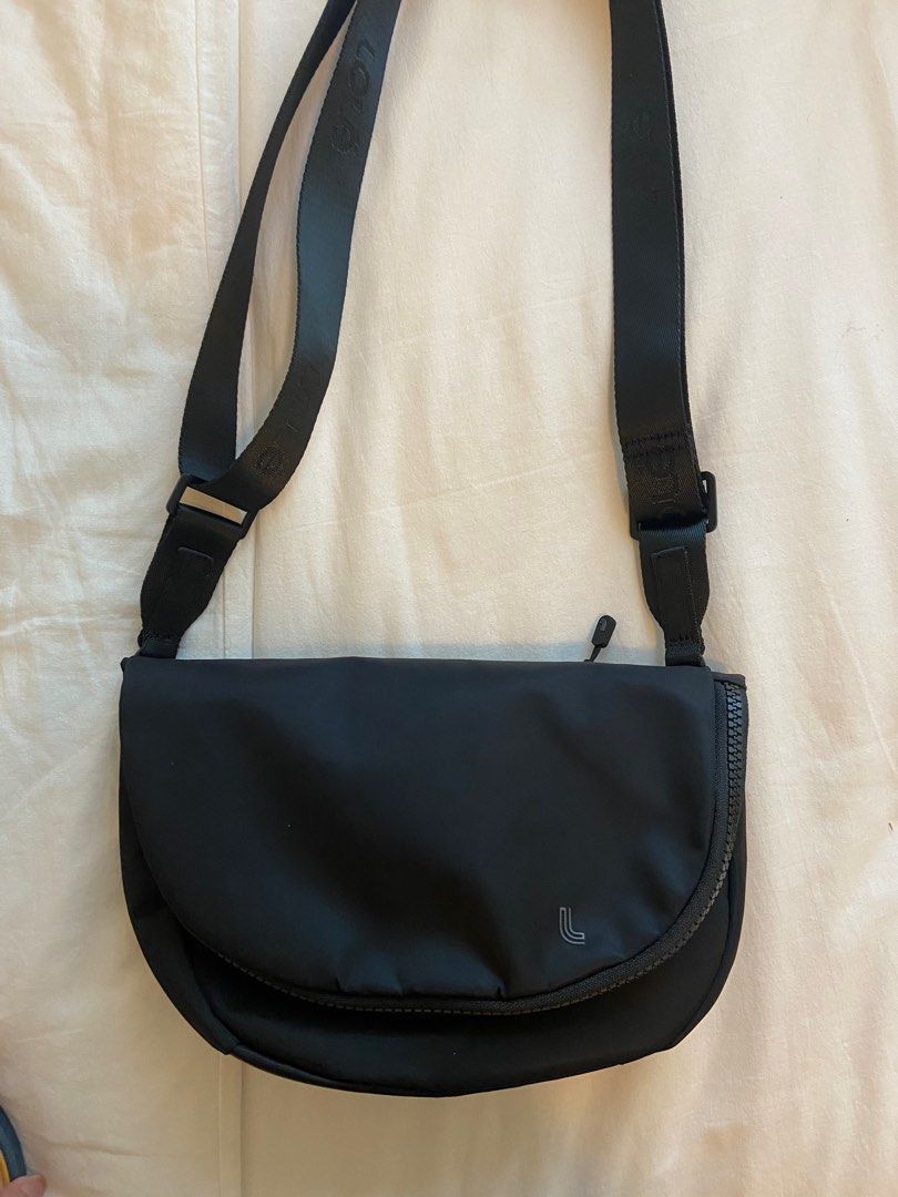Lolë Waterproof Sling Bag (Category: Sling Bags) located in Manila. Submitted by a_kyle (Listing ID 1351858755, Image 1). Description: Used once only, good as new Lululemon sling bag dupe! Bought in the US Shipping to be shouldered by buyer.