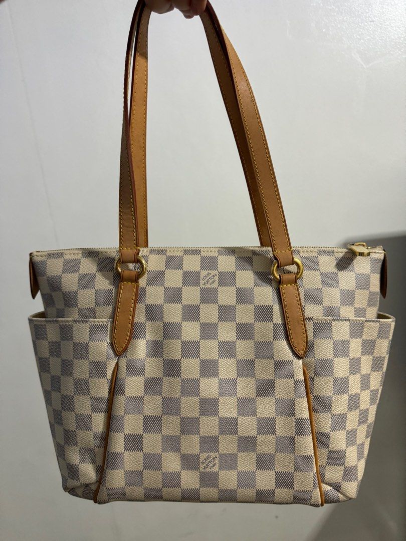 Louis Vuitton Totally PM (Category: Luxury Bags & Wallets) located in Manila. Submitted by chelley11 (Listing ID 1351917645, Image 1). Description: Louis Vuitton Totally size PM With dustbag Rank 9/10 (barely used but signs of storage on vanchetta leather) .