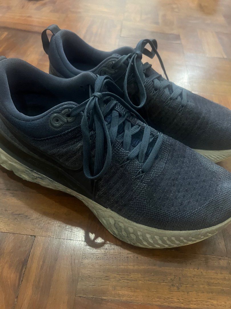 Nike React Infinity Run Flyknit 2 Blue (Category: Sneakers) located in Mandaluyong City. Submitted by ynnlvrs (Listing ID 1351912207, Image 1). Description: - In good condition (but has some flaws - tongue logo has sort of faded left shoe & some paint stain in the side soles of both shoes) - Bought 2021 - No box - SIZE: 10.5 Mop: Gcash Mandaluyong, Metro Manila.