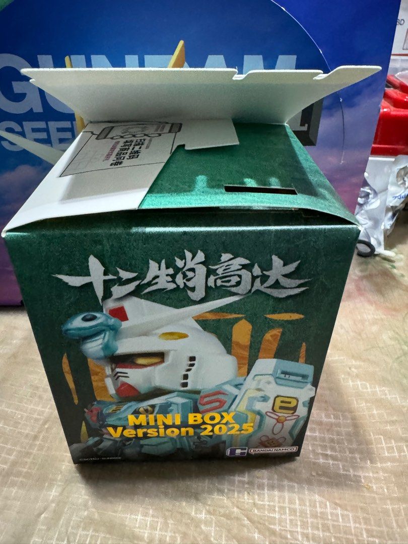 Selling mini box version 2025 十二生肖高达 box opened but wrapper not tear got snake ver,rabbit, ox and pig version (Category: Designer & Blind Box Toys) located in Singapore. Submitted by beck088 (Listing ID 1351937598, Image 2). Description: Selling mini box version 2025 十二生肖高达 box opened but wrapper not tear got snake ver,rabbit, ox and pig version Selling at $22 each Pm if interested Add $3 for smartpac mail .