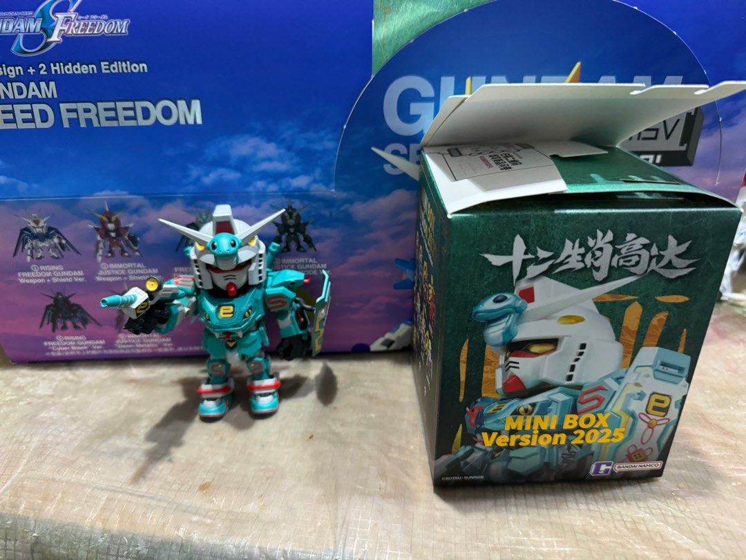 Selling mini box version 2025 十二生肖高达 box opened but wrapper not tear got snake ver,rabbit, ox and pig version (Category: Designer & Blind Box Toys) located in Singapore. Submitted by beck088 (Listing ID 1351937598, Image 3). Description: Selling mini box version 2025 十二生肖高达 box opened but wrapper not tear got snake ver,rabbit, ox and pig version Selling at $22 each Pm if interested Add $3 for smartpac mail .