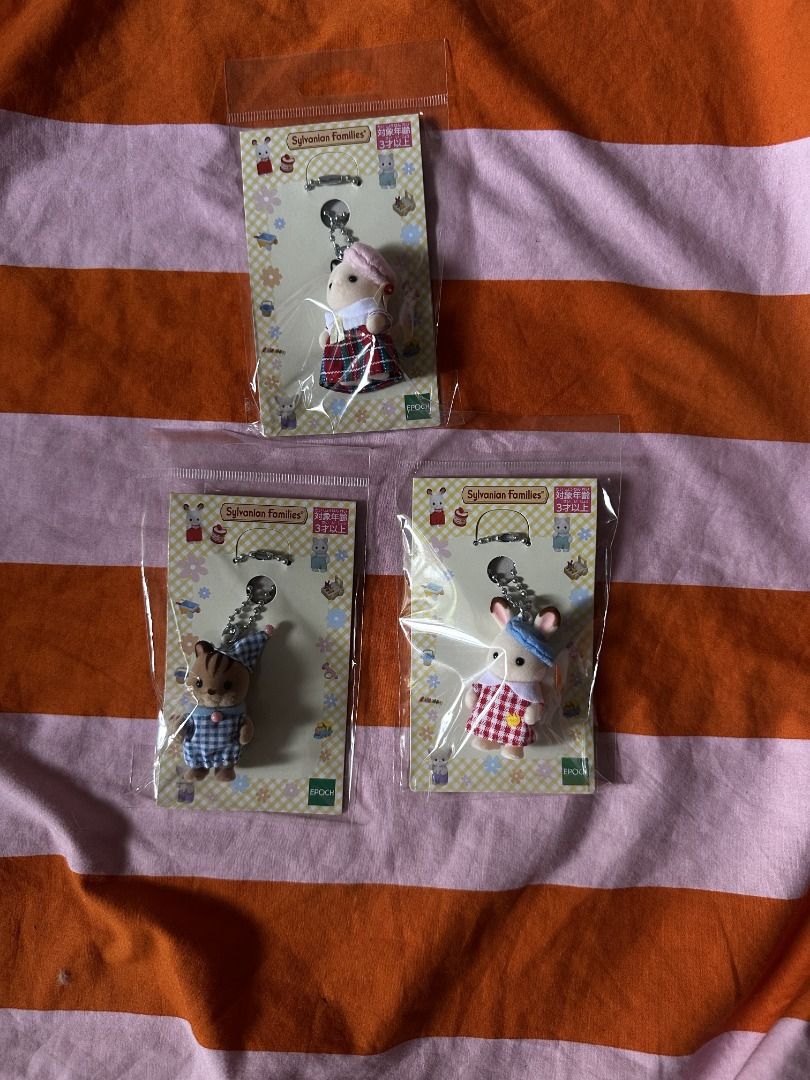 Sylvanian Families Keychain (Category: Character Goods) located in Quezon City. Submitted by pantone.u (Listing ID 1351897981, Image 1). Description: Sylvanian Families Keychain Brand New, On hand ₱ 680 ea + lsf 1. Choco Rabbit in School Uniform with Blue Hat 2. Charcoal Cat in Sailor Style Uniform with Pink Hat - sold 3. Baby Squirrel in Pajamas mop: gcash/bdo mod: ggx/jnt/sdd(lalamove/grab) loc: qc.