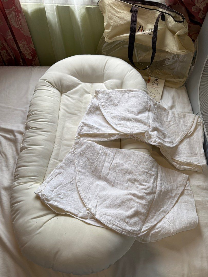 Uyayi Baby Nest (Category: Other Kids Furniture) located in Bacoor. Submitted by nixxpreloved (Listing ID 1351795541, Image 1). Description: Uyayi Baby Nest with 2 covers (color White).