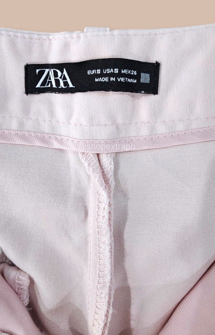 Zara Women's Buttoned Bermuda Shorts (Category: Shorts) located in Paranaque City. Submitted by shopextraph (Listing ID 1351864392, Image 3). Description: [Pre-owned] Zara Women's High Waist Buttoned Bermuda Shorts Color: Light Pink Size: U/EU Small Used 5x. No other inclusions. All photos taken by the seller..