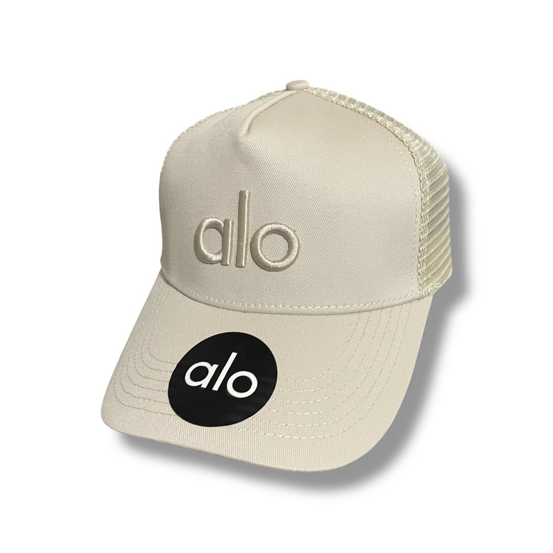 Alo Yoga District Trucker Cap (beige) (Category: Caps & Hats) located in Marikina City. Submitted by 1800shelves (Listing ID 1351973377, Image 1). Description: Alo Yoga District Trucker Hat (beige) Brand new with tag One size fits all - adjustable 🏷️ P 1,499 PM for more details. Tags: Alo, alo yoga, alo cap.