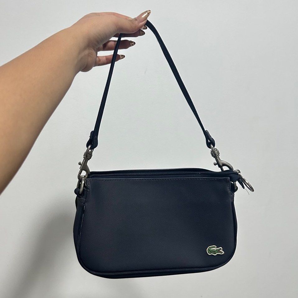 ( SOLD ) Authentic Lacoste baguette bag (Category: Luxury Bags & Wallets) located in Quezon City. Submitted by BrY2K (Listing ID 1351963210, Image 1). Description: so clean inside super ganda barely no flaws swerte ng makaka get nito 100% auth with tags .
