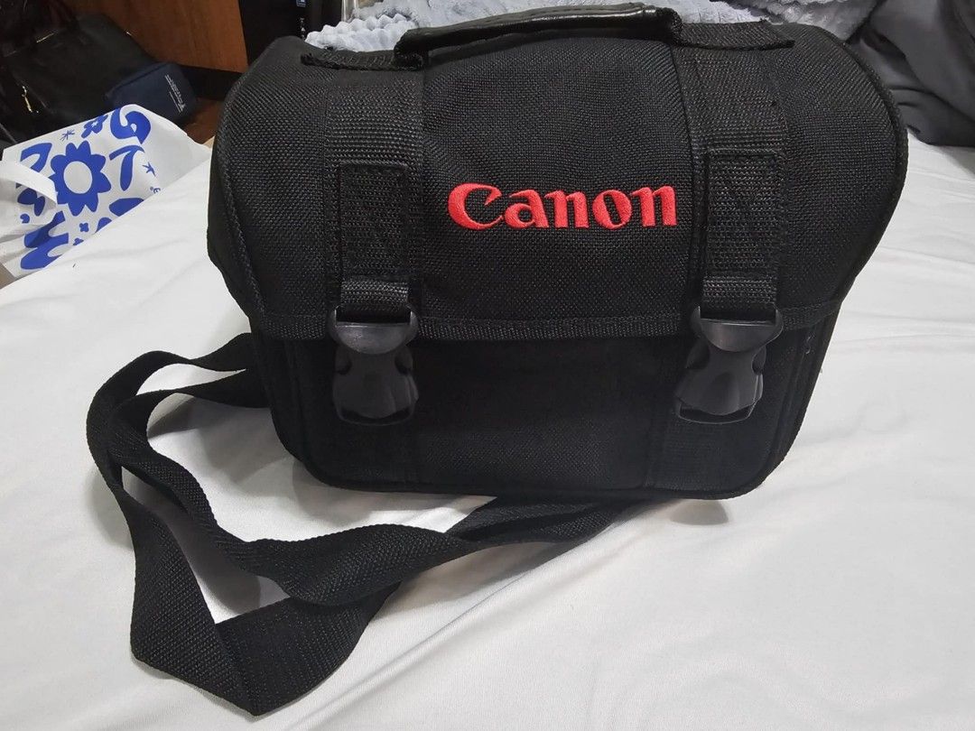 Cannon camera bag (Category: Camera Bags & Carriers) located in Manila. Submitted by mommiedeclutter (Listing ID 1352061448, Image 1). Description: Cannon camera bag brand new LWH 9 inches × 5 inches x 7 inches rfs: decluttering.