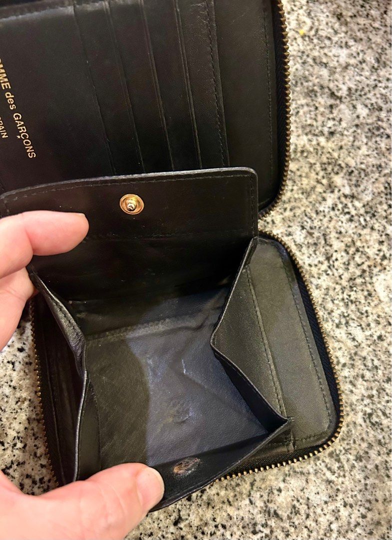 CDG zip around leather wallet (Category: Luxury Bags & Wallets) located in Quezon City. Submitted by asiaco (Listing ID 1352020480, Image 2). Description: Comme des GARCONS made in spain unisex wallet in black. Preloved with signs of usage but no flaws. Hard to find. .